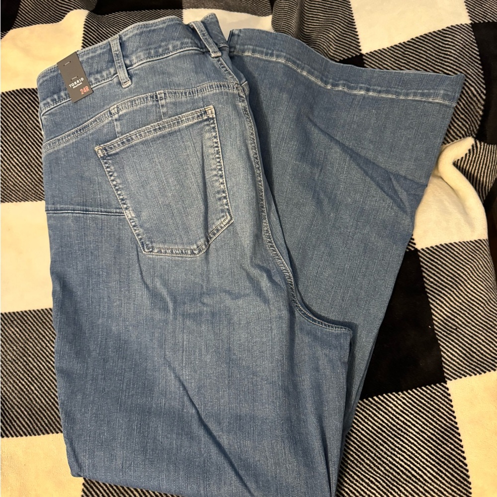 Torrid jeans size 24 
Romper size 4x